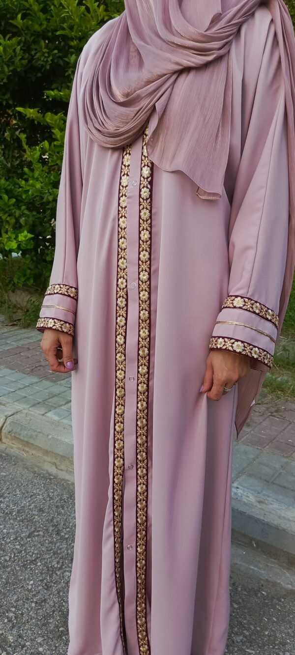 A light pink abaya with golden floral embroidery size:56