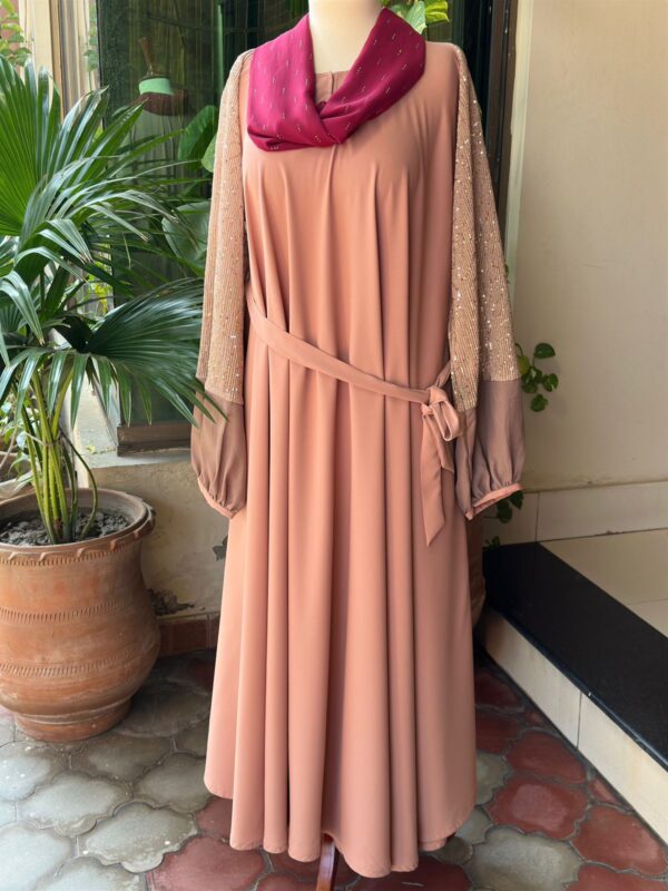 Peach with shimmery sleeves