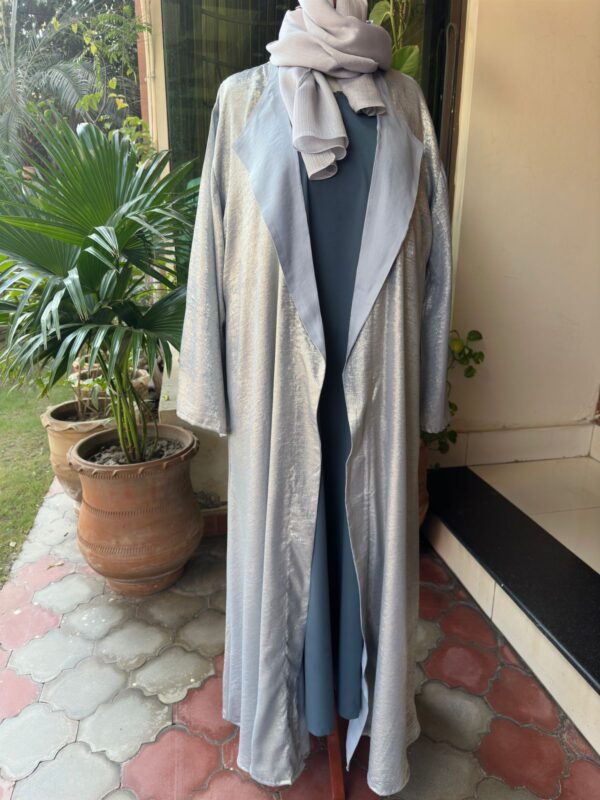 shimmery lava silk gown layered over an inner dress.