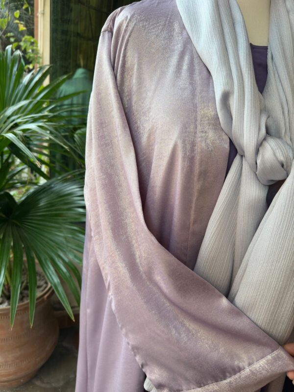 shimmery lava silk gown layered over an inner dress - Image 3
