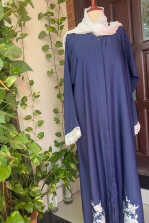 Navy blue abaya with delicate white lace detailing